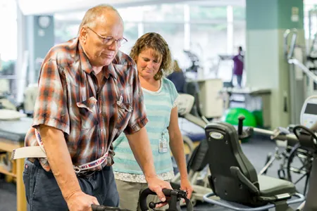 Rehab Center employee with patient